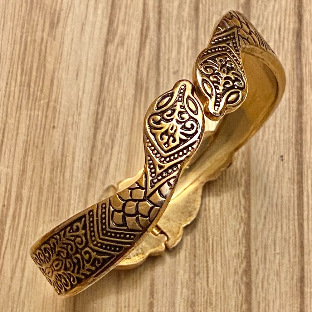 Gold Toned Hinged Bracelet.